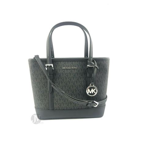 michael kors jet set travel carryall convertible tote|Michael Kors jet set silver.